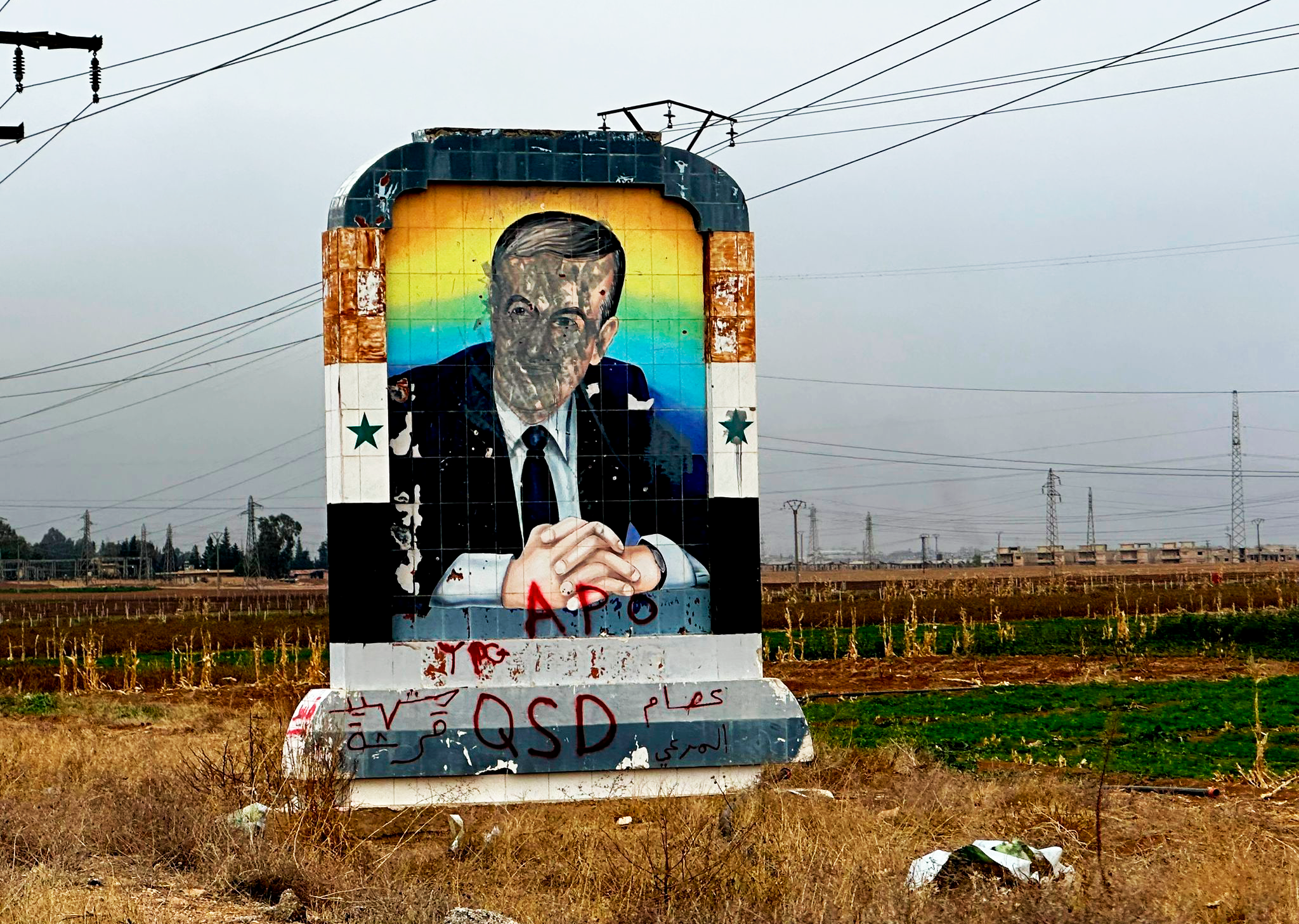 Postal de Hafez al Assad, padre del presidente anterior de Siria (Bashar al Assad) en la carretera del aeropuerto de Qamishlo (Rojava). | Amina Hussein